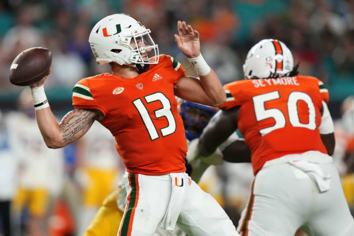 Nov 26, 2022; Miami Gardens, Florida, USA; Miami Hurricanes quarterback Jake Garcia (13) attempts a pass against the Pittsburgh Panthers during the first half at Hard Rock Stadium. Mandatory Credit: Jasen Vinlove-USA TODAY Sports